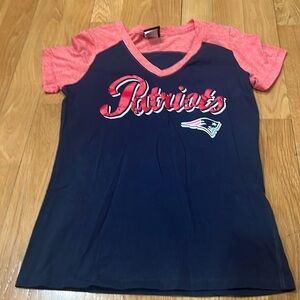 NFL women’s New England patriots short sleeve shirt size medium.